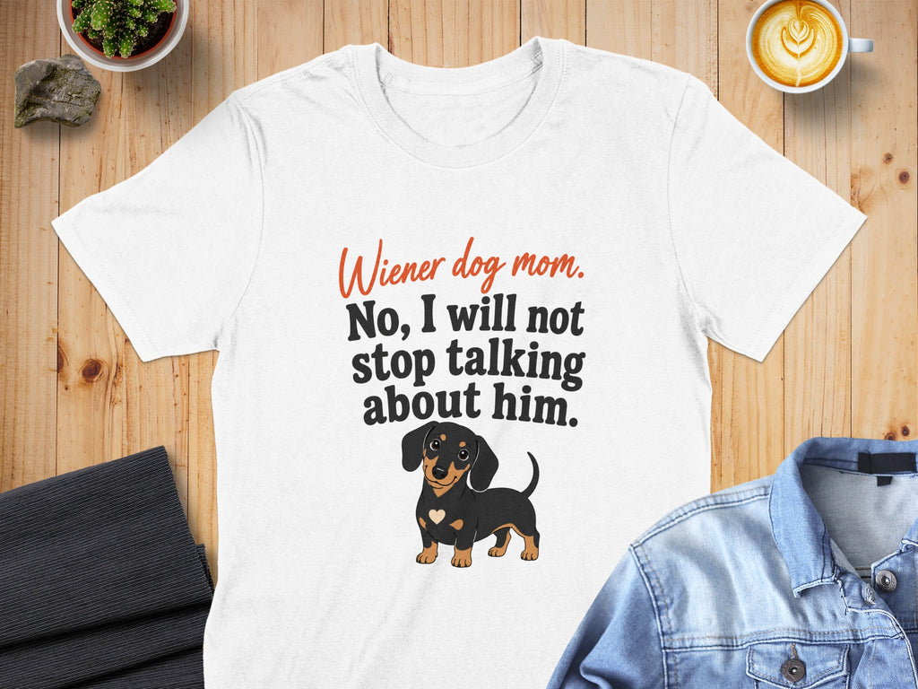 White t-shirt with dachshund graphic and "Wiener dog mom" text.