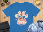 Blue t-shirt featuring a paw print graphic with "Dog Mom Era" in retro font.