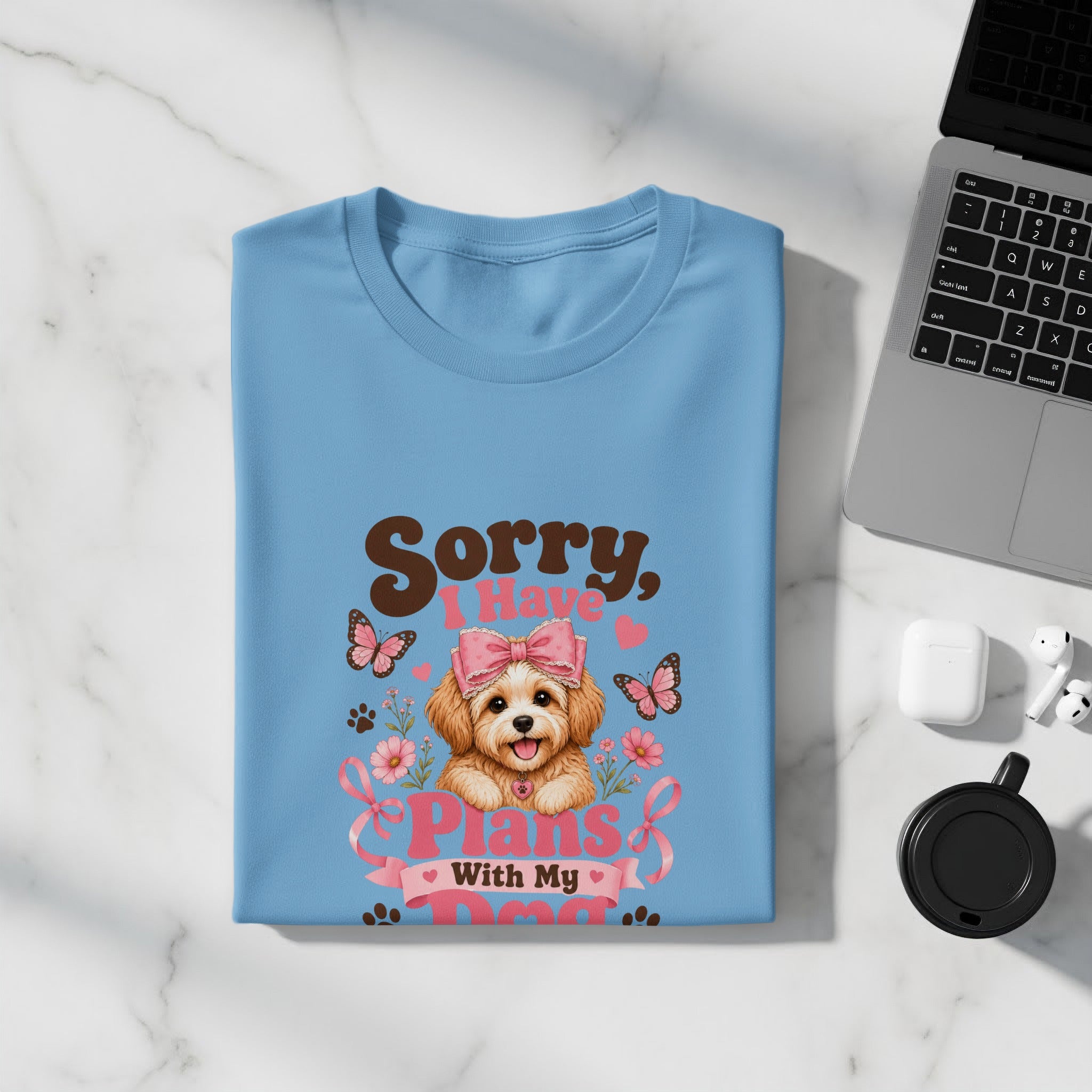Blue t-shirt with a cartoon dog, pink bow, and text "Sorry, I Have Plans With My Dog."