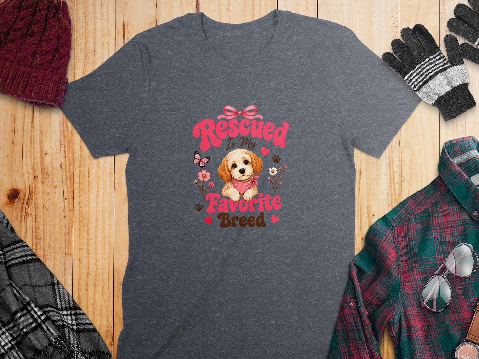 Dark grey t-shirt with "Rescued is my favorite breed" text and a dog graphic.