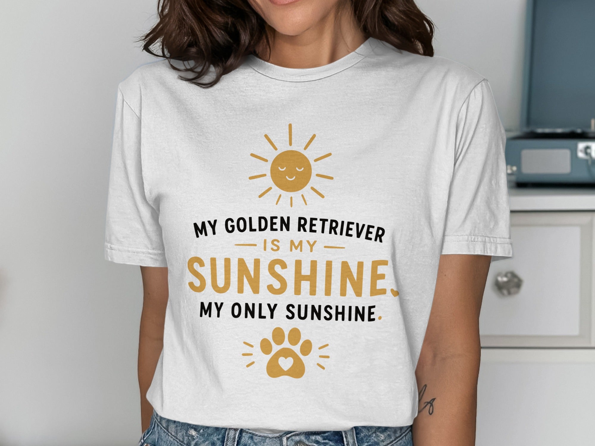 White T-shirt with "My Golden Retriever is my Sunshine. My only sunshine." text and paw print.