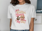 White t-shirt with "Coffee, Bows & My Dog" text and a puppy in a coffee cup.