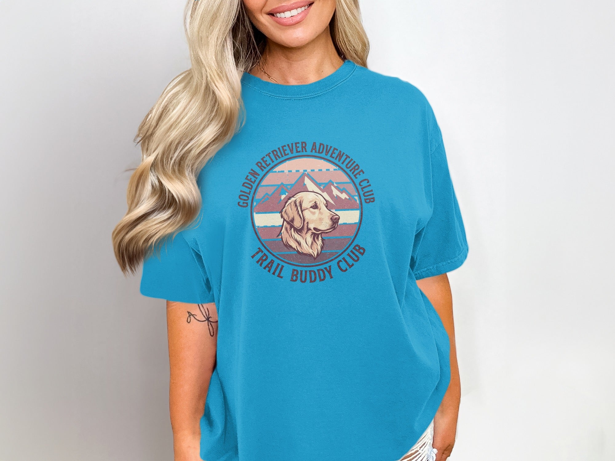 Golden Retriever Adventure Club Trail Buddy Club t-shirt design with mountains.