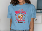 Blue t-shirt with "Rescued Is My Favorite Breed" and a cute puppy graphic.