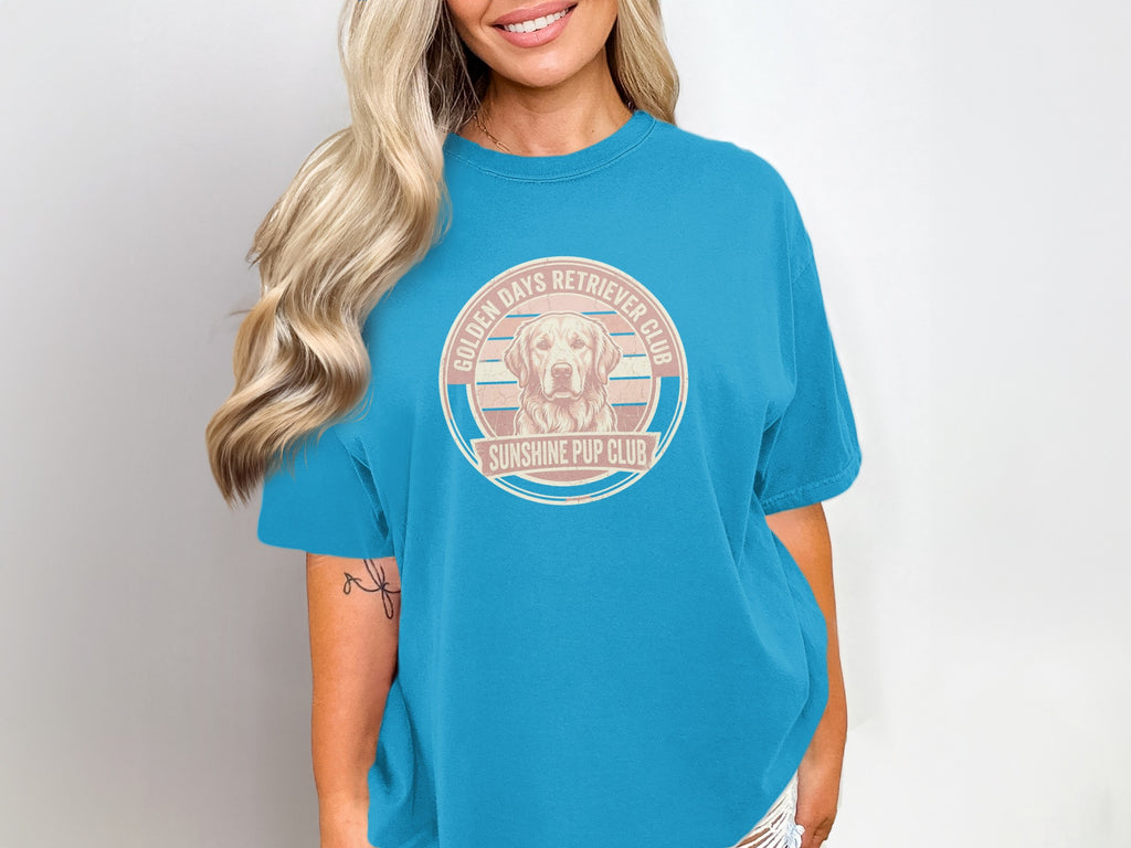 Teal t-shirt with Golden Retriever dog graphic and "Sunshine Pup Club" text.
