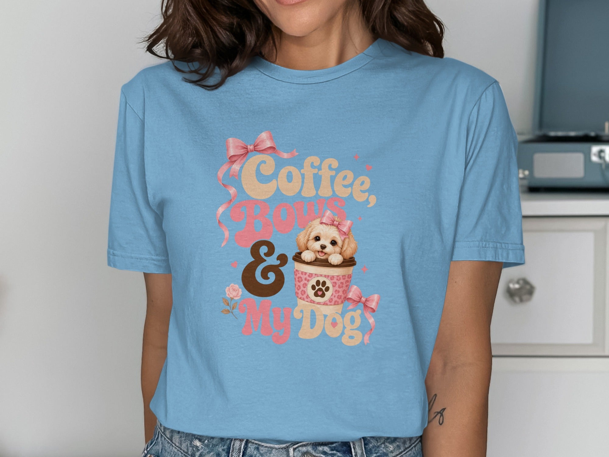 Blue t-shirt with "Coffee, Bows & My Dog" text and a puppy in a coffee cup.