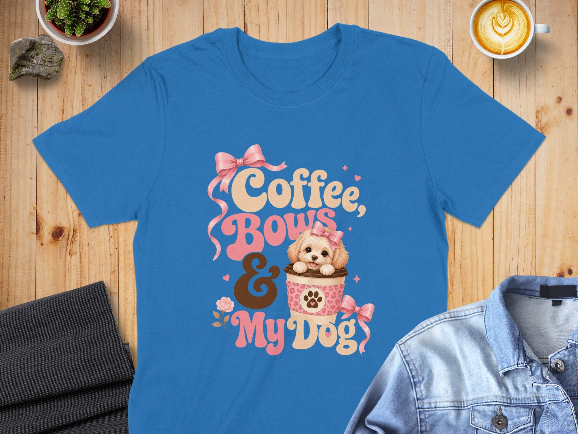 Blue t-shirt with "Coffee, Bows & My Dog" text and a dog in a coffee cup.