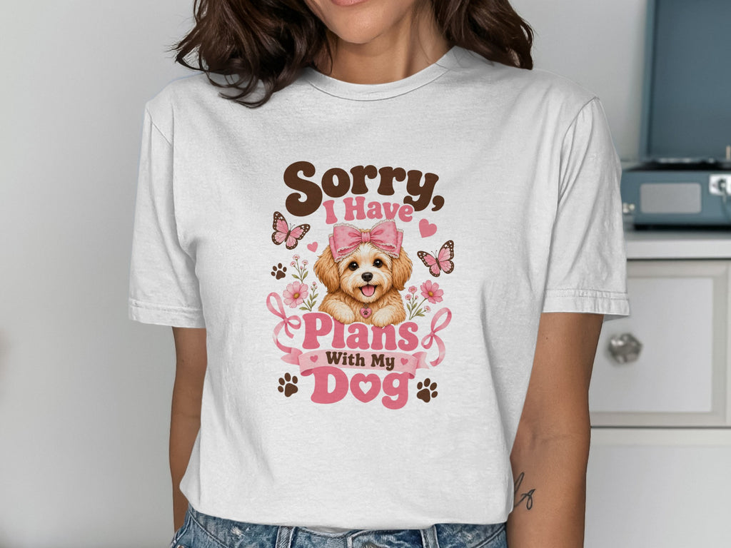 White t-shirt with "Sorry, I Have Plans With My Dog" and a cartoon dog.