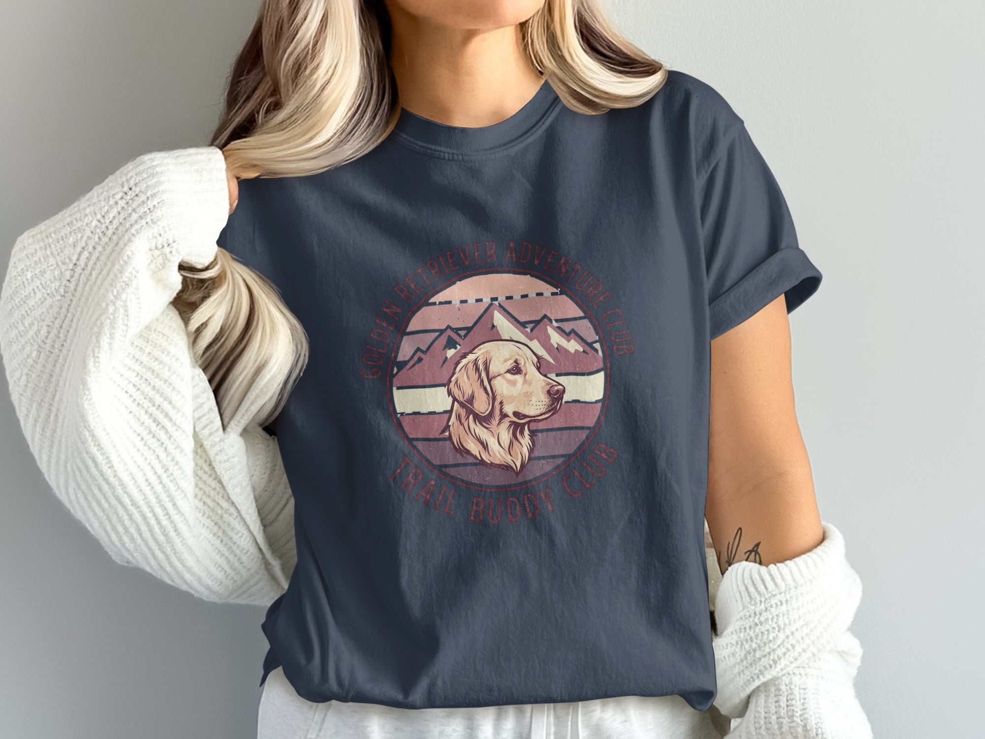 Golden Retriever dog and mountain graphic tee with "Trail Buddy Club" text.