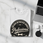 White t-shirt featuring "Golden Retriever Owner Professional" text and a dog bone graphic.