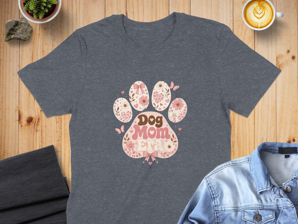 Dark gray t-shirt with a pink floral dog paw print graphic and the words "Dog Mom".