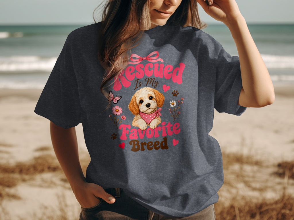 T-shirt graphic with rescued dog, heart, flowers, and text.