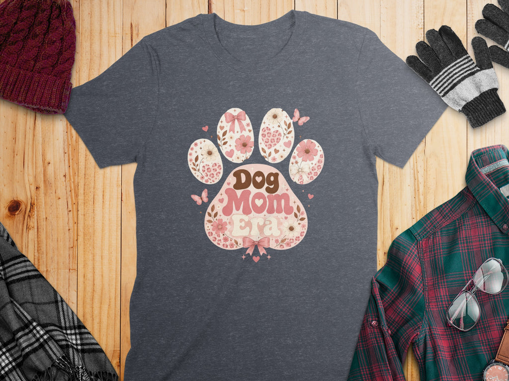 Dark grey t-shirt with a pink paw print design that reads “Dog Mom Era.”