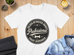 White t-shirt with black circular graphic that reads "Golden Retriever Owner Professional Treat Dispenser."