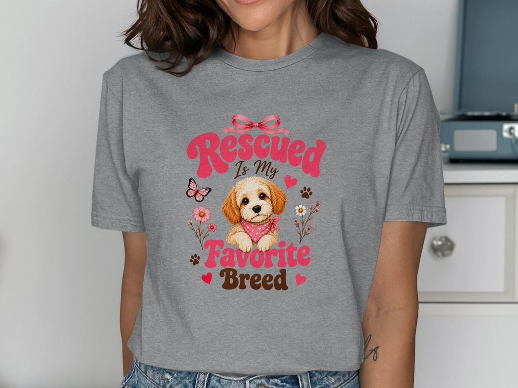 Gray t-shirt with a cute puppy, pink bow, and "Rescued Is My Favorite Breed" text.