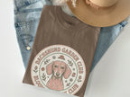 Brown t-shirt with Dachshund Garden Club graphic, featuring a dog and floral accents.