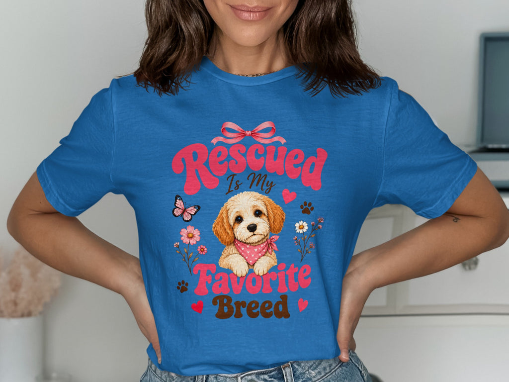 Blue t-shirt with "Rescued Is My Favorite Breed" text and a puppy graphic.
