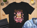 Black t-shirt with "Sorry, I Have Plans With My Dog" graphic and puppy.
