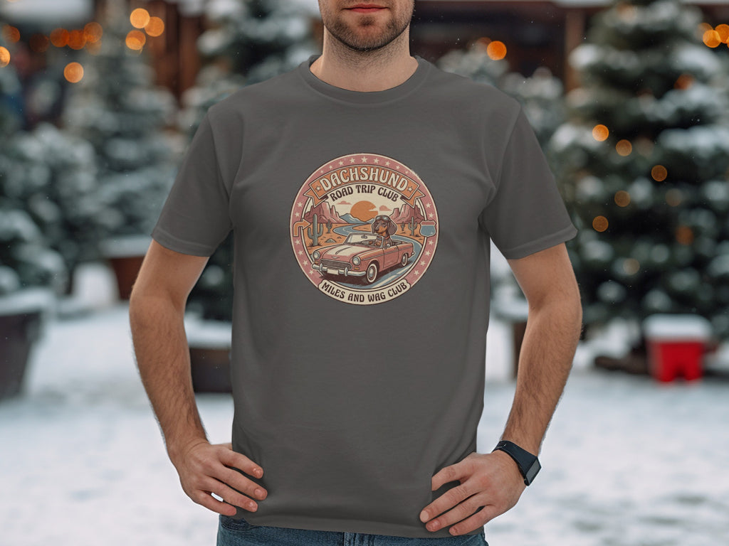 Dark grey t-shirt with "Dachshund Road Trip Club" graphic featuring a car and desert landscape.