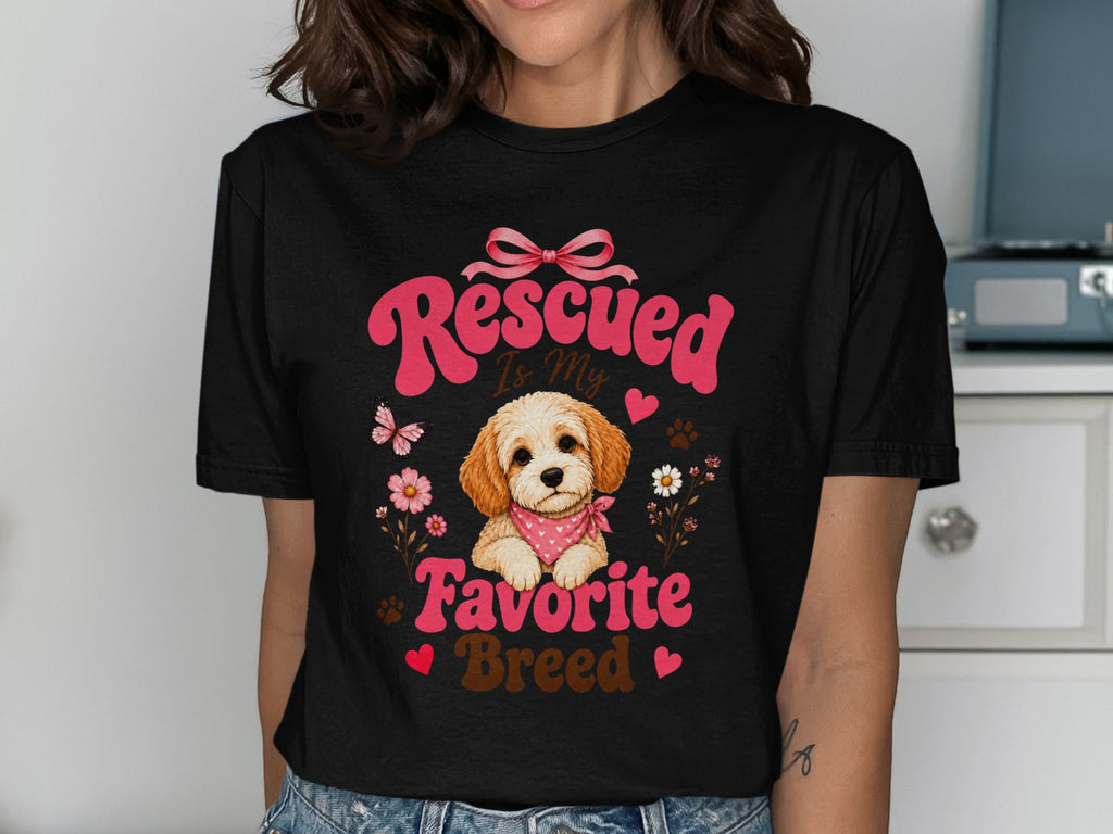 Black t-shirt with "Rescued Is My Favorite Breed" text and a puppy graphic.