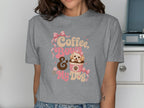 Gray t-shirt with "Coffee, Bows & My Dog" text and a cute dog in a coffee cup.