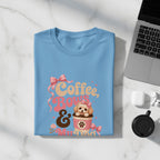 Light blue t-shirt with "Coffee, Bows & My Dog" graphic and pink ribbon.