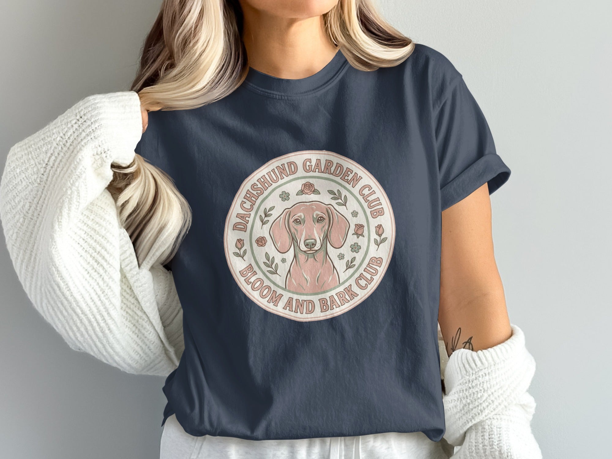 Dachshund Garden Club Bloom and Bark Club emblem with a dog and roses.