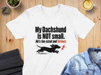 White t-shirt with "My Dachshund is NOT small. He's fun-sized and furious." text.