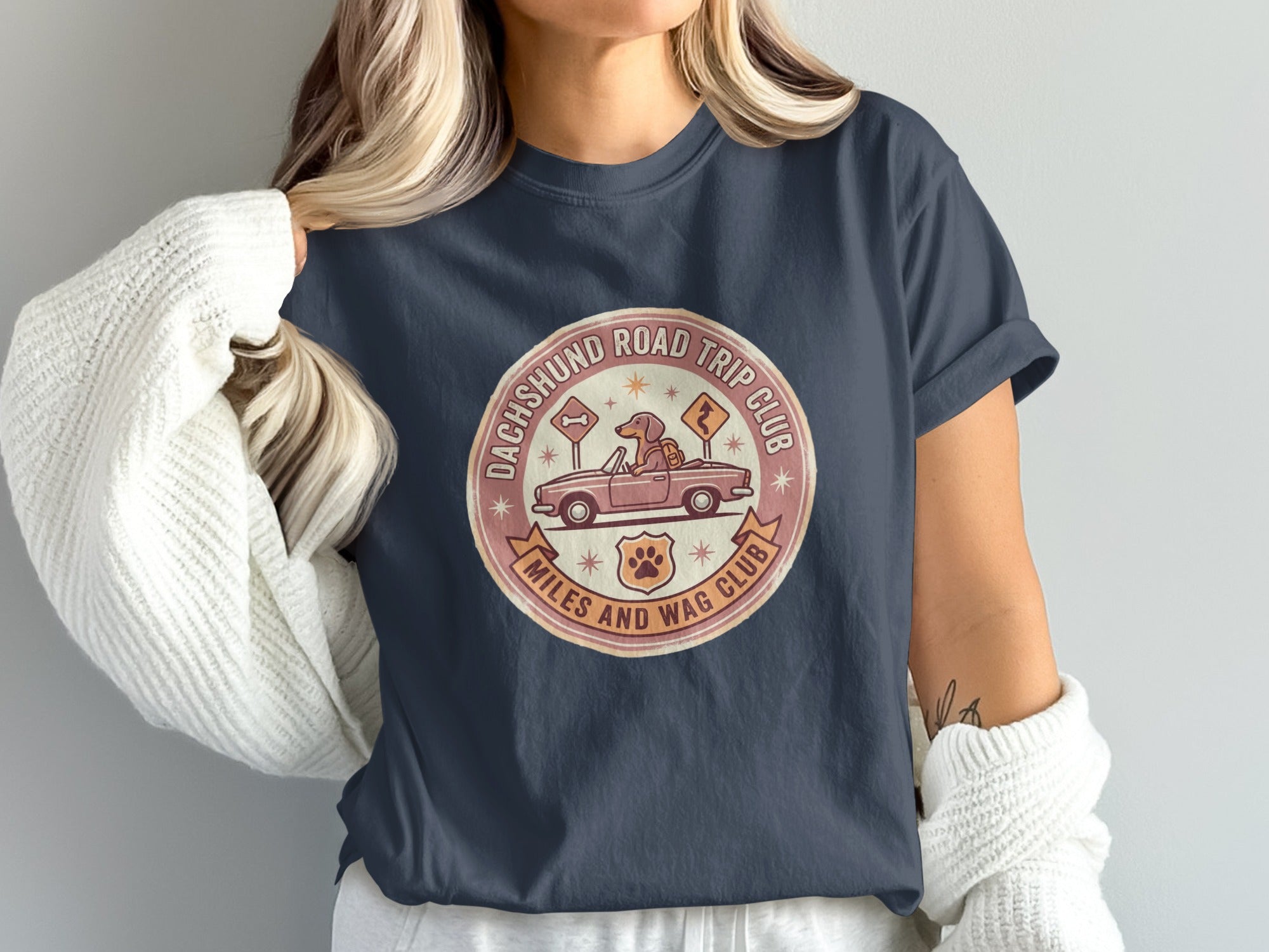Dachshund Road Trip Club Miles and Wag Club graphic on a dark t-shirt.
