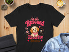 Black t-shirt with "Rescued Is My Favorite Breed" and a cute dog graphic.