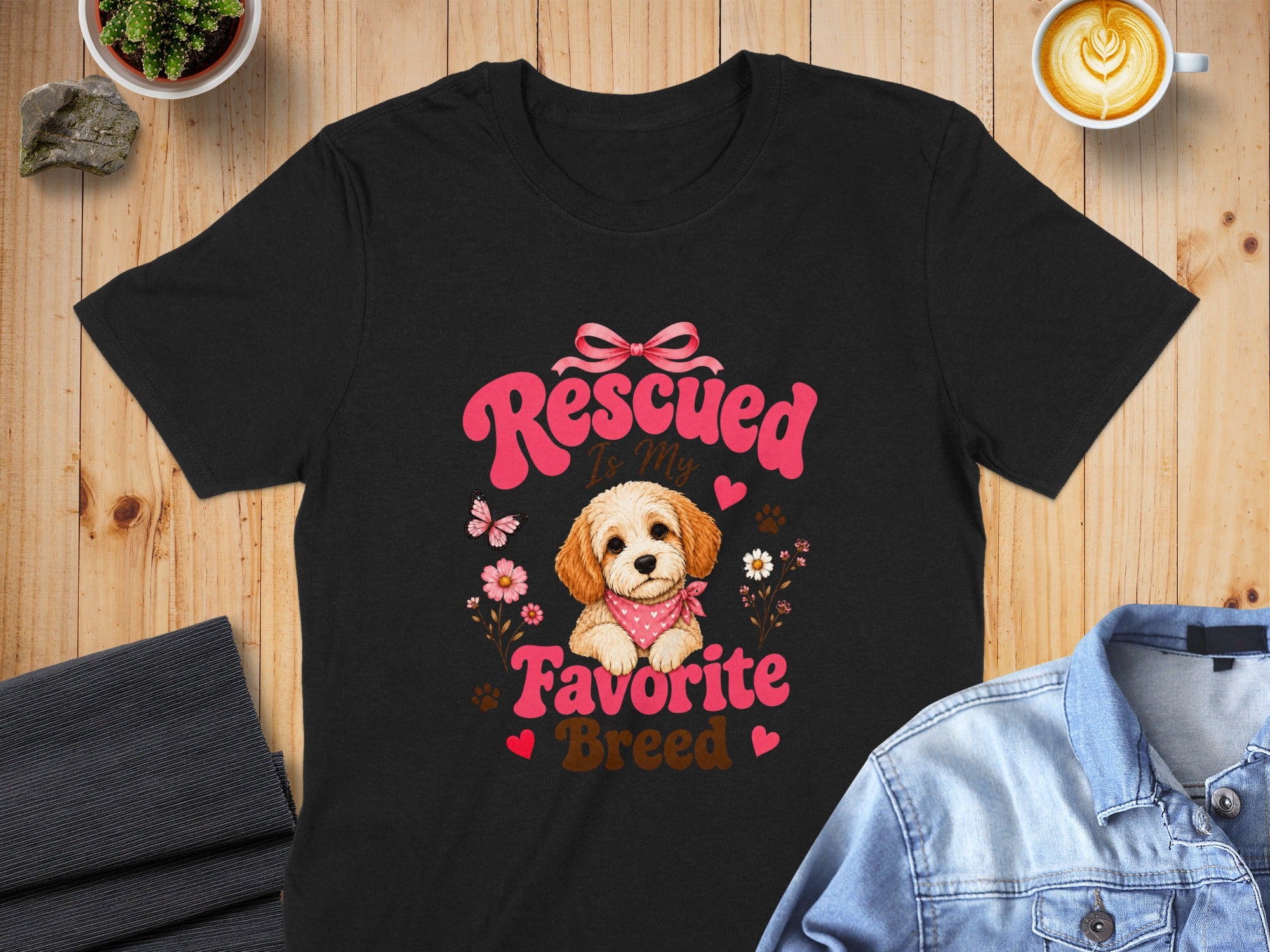 Black t-shirt with "Rescued Is My Favorite Breed" and a cute dog graphic.