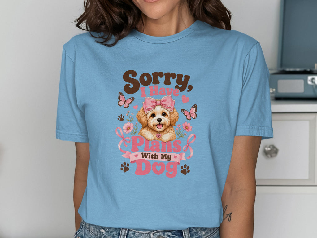 Light blue t-shirt with a dog and the text "Sorry I Have Plans With My Dog".