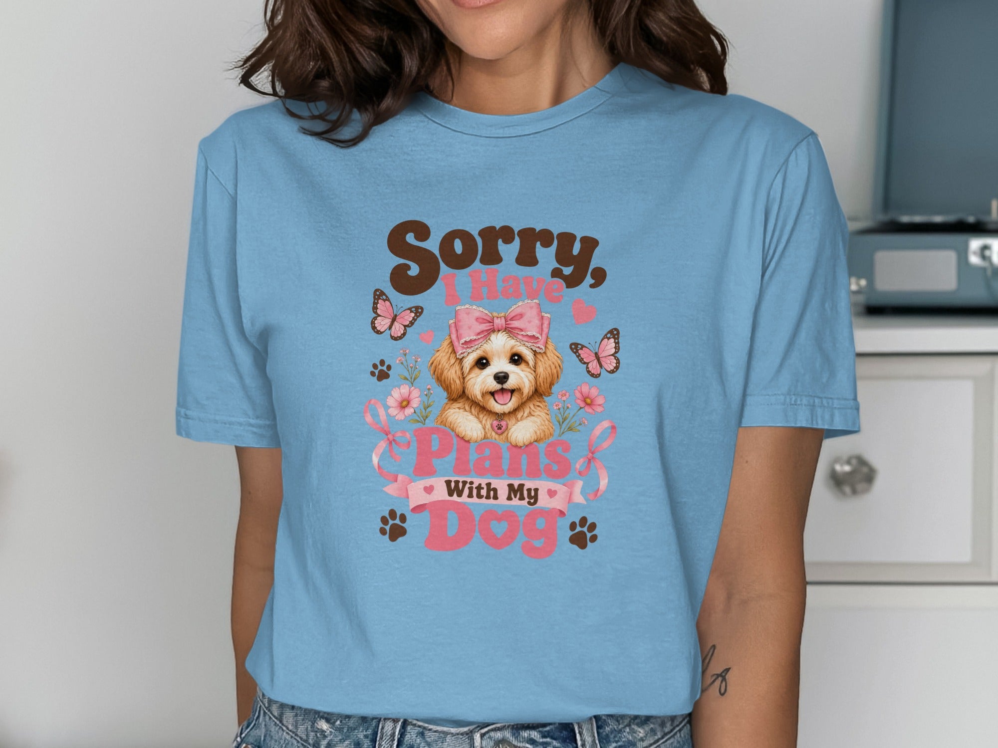 Light blue t-shirt with a dog and the text "Sorry I Have Plans With My Dog".