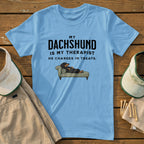 Light blue t-shirt with "My Dachshund is my therapist" text and cartoon dog.