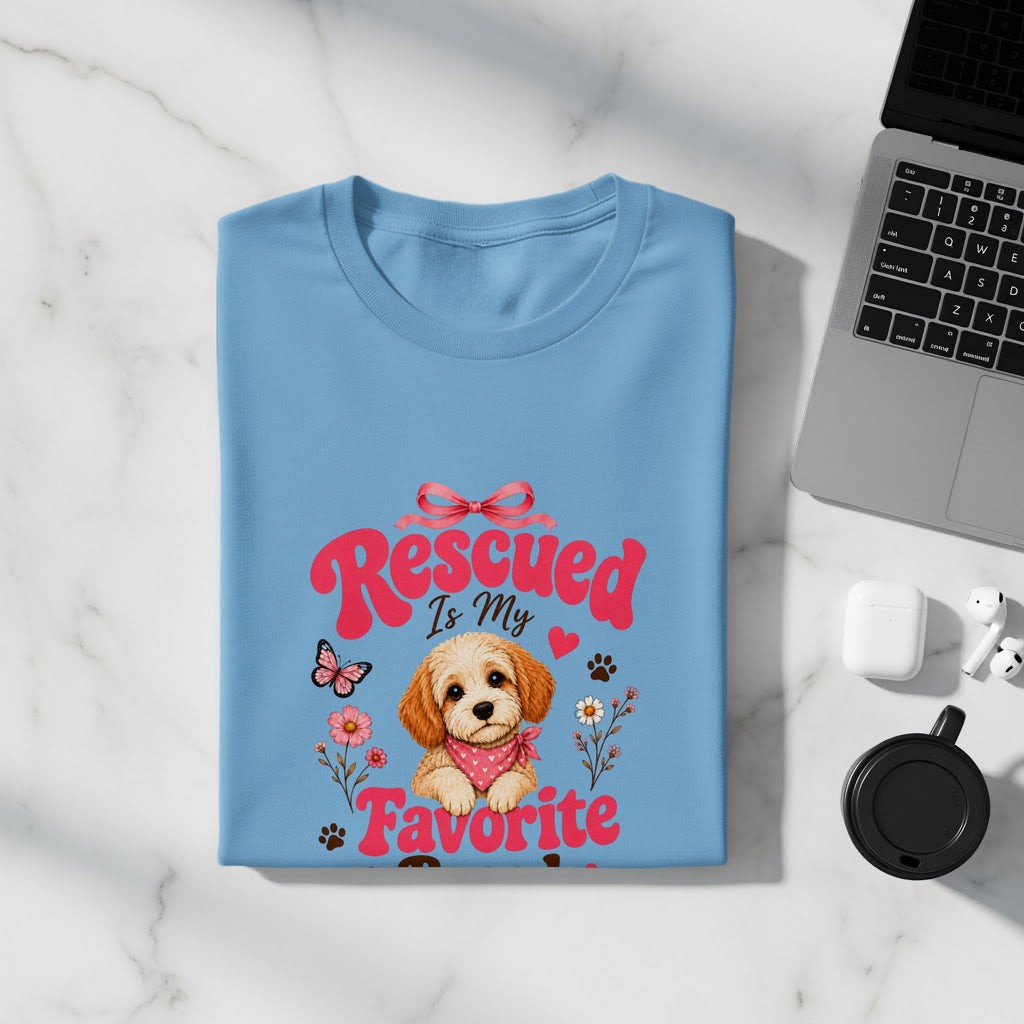 Light blue t-shirt with "Rescued is My Favorite" and dog graphic.