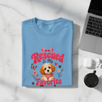Light blue t-shirt with "Rescued is My Favorite" and dog graphic.