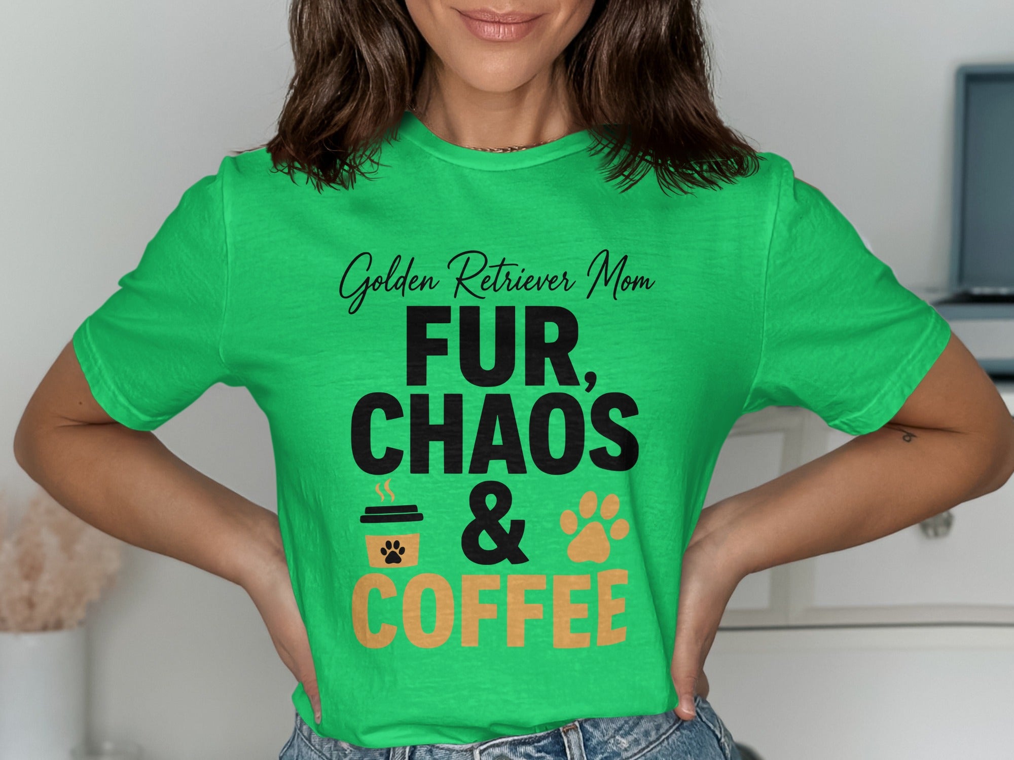 Green t-shirt with text "Golden Retriever Mom, FUR, CHAOS & COFFEE" and icons.